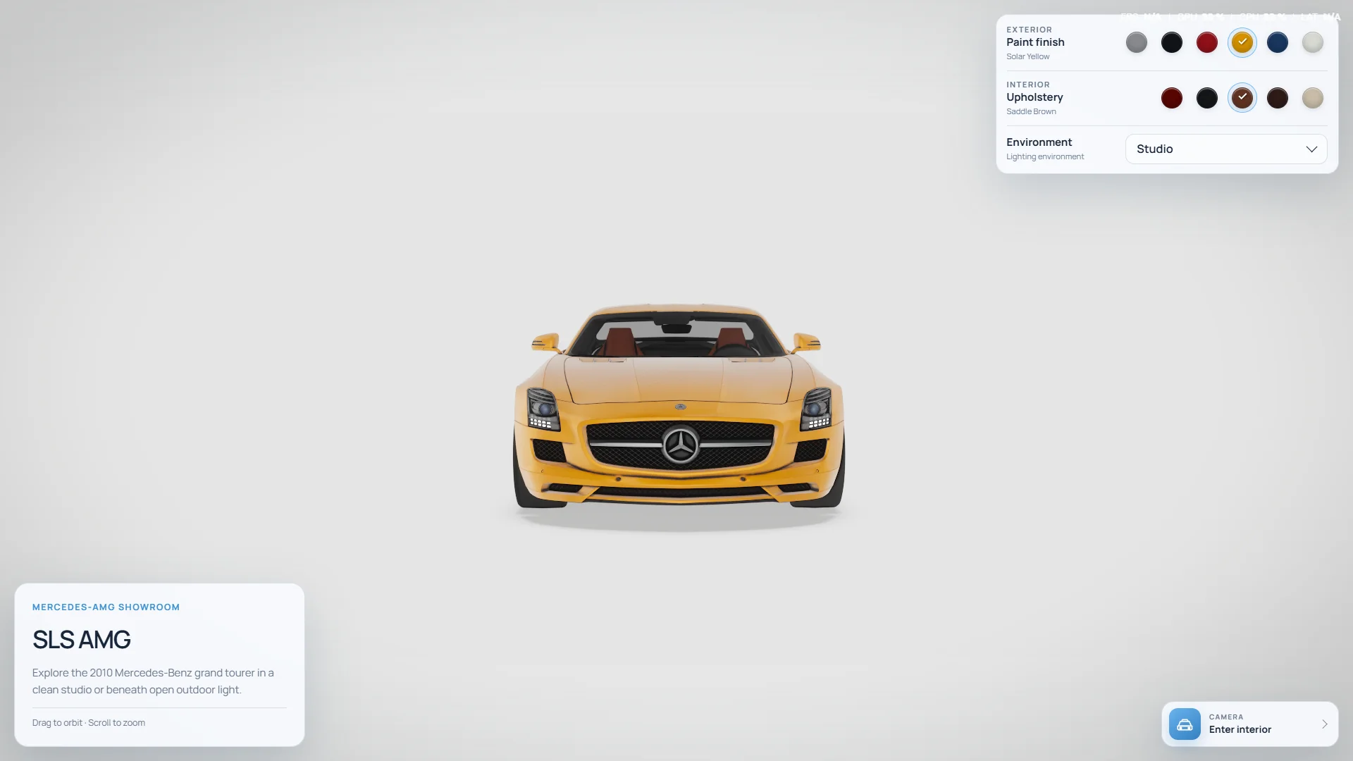 Front view of a Solar Yellow SLS AMG in the neutral studio environment.