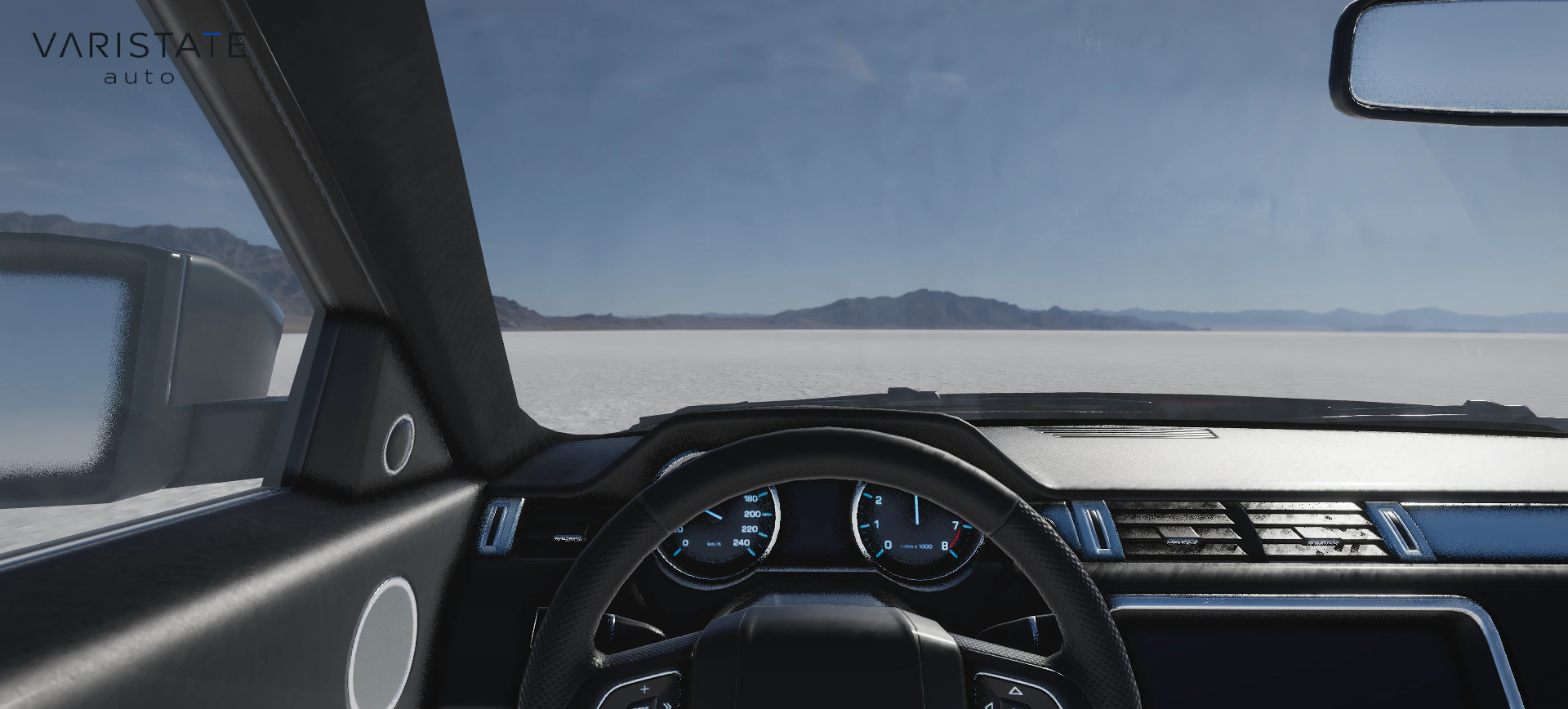 Driver-eye view of the SUV steering wheel and instruments with the salt-flat mountains beyond the windshield.