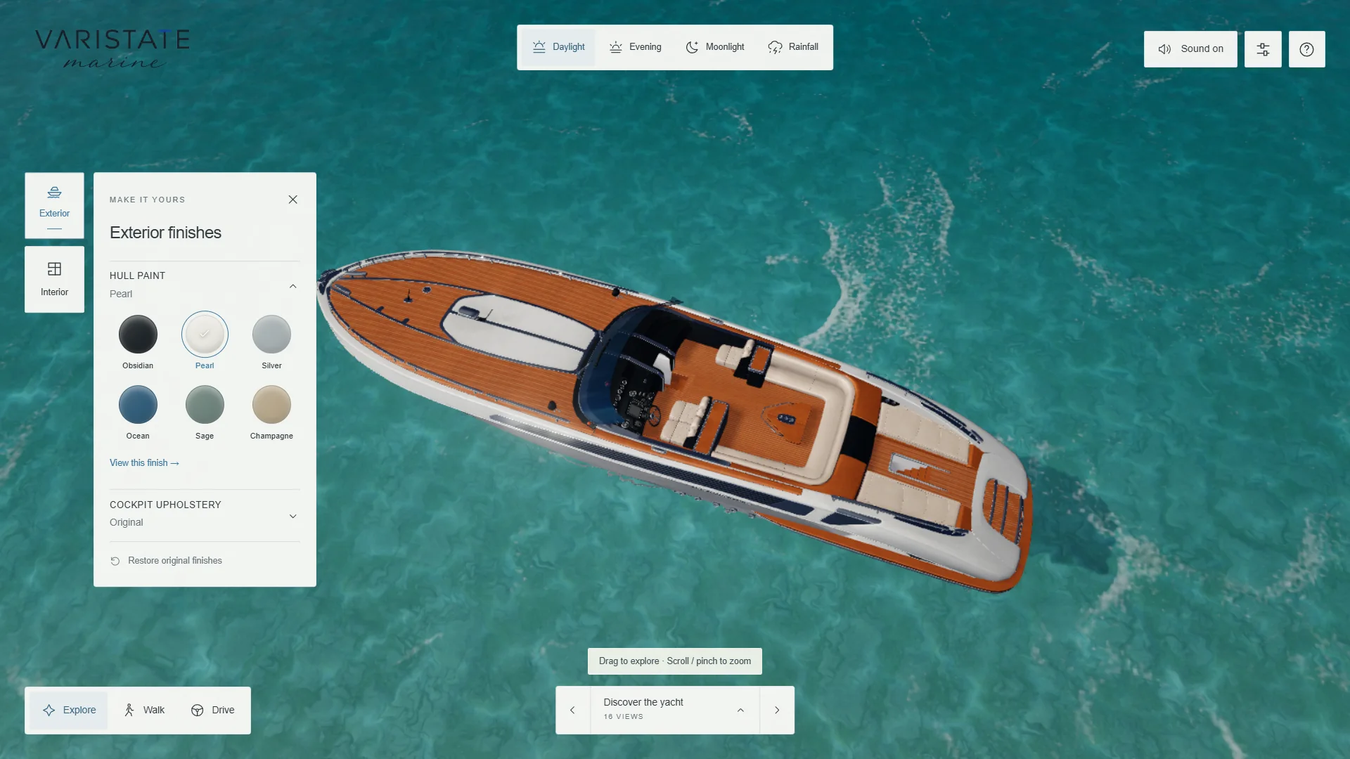 Yacht seen from above on open water with its exterior finish controls visible.