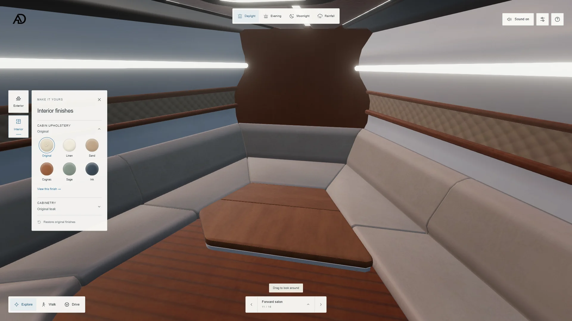 Yacht salon with interior upholstery and cabinetry controls visible.